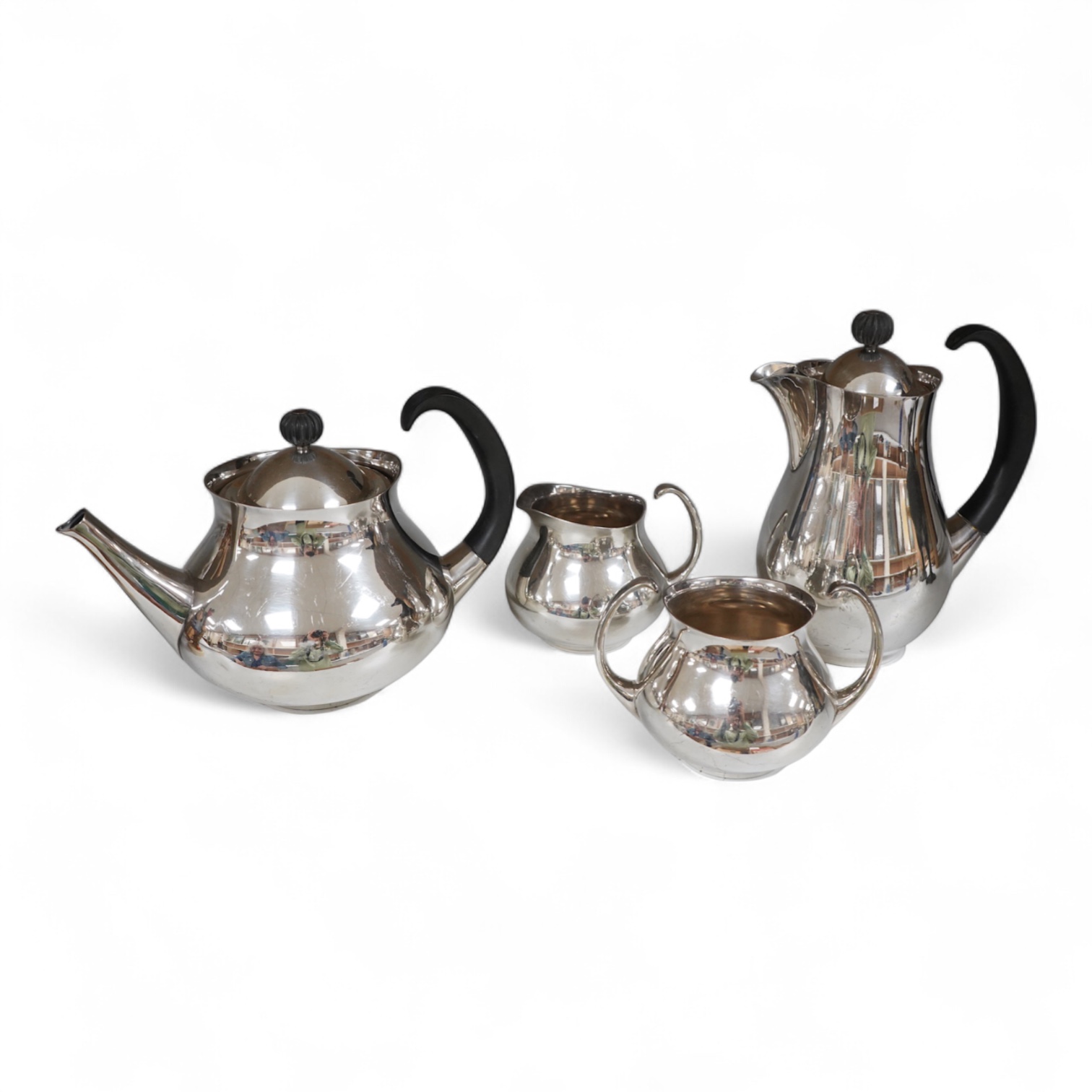 Eric Clements (1925-2019) a four piece plated tea set, c.1960, Embassy plate by M&W England, water jug and cover, 19.5cm high